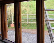 Wooden window frames to be restored.