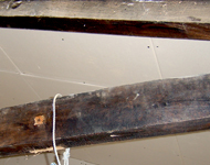Wooden beams to be restored.