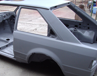 Car body after sandblasting.