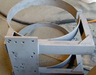 Lorry parts before and after sandblasting.