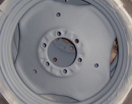 Vintage tractor wheels during restoration.